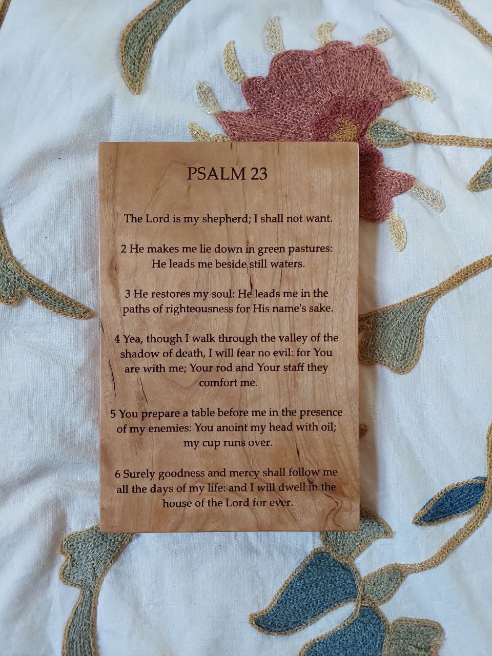 Front view of a cherry wood plaque deeply engraved with the full scripture text of Psalm 23.