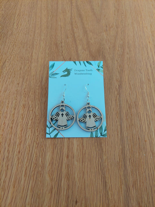 Pure blonde natural maple wood angel earrings featuring an elegant laser-cut silhouette and hypoallergenic hooks.