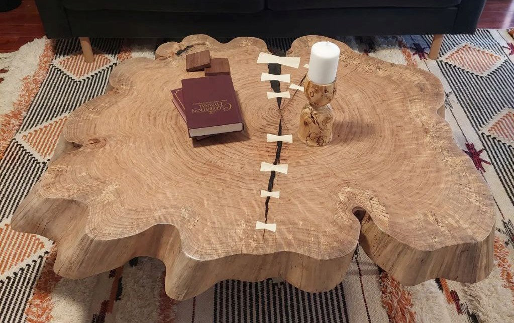 Black oak wood cookie table with epoxy fill and holly bowtie dutchmen