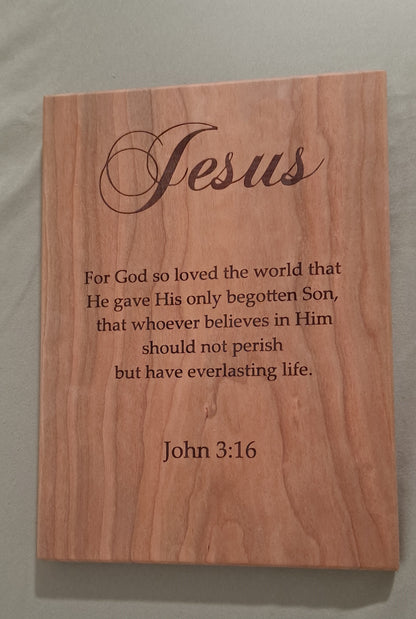 An alternate front view of a solid cherry John 3:16 bible verse plaque, highlighting the deep natural wood grain and precision engraving.