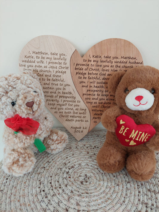 Front-facing view of a personalized heart-shaped cherry wood plaque engraved with custom wedding vows.